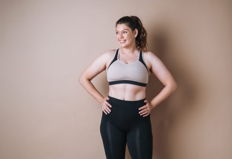 self,loving,young,woman,plus,size,in,sport,wear,on